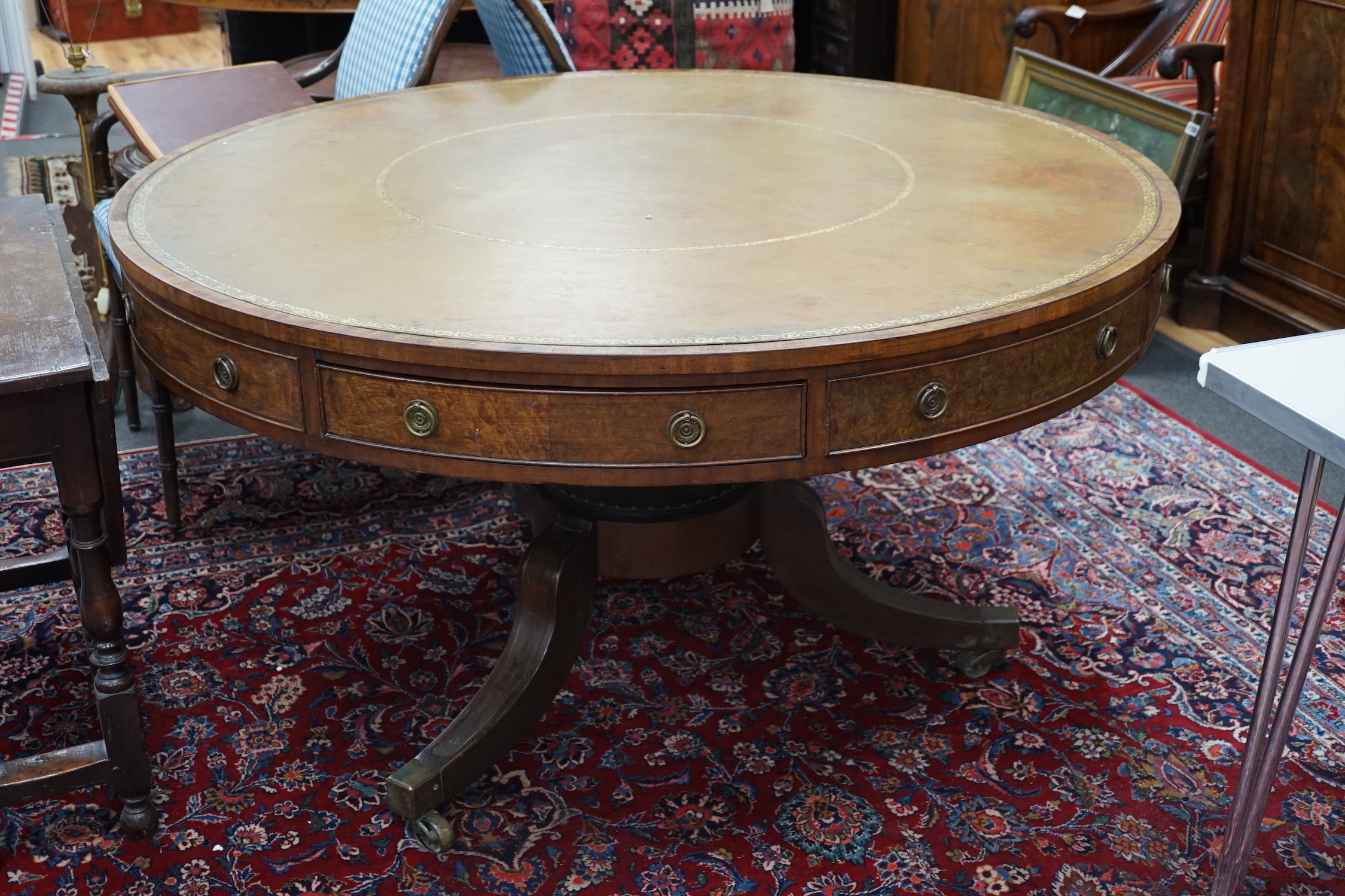 A Regency and later circular mahogany drum table, diameter 136cm, height 74cm